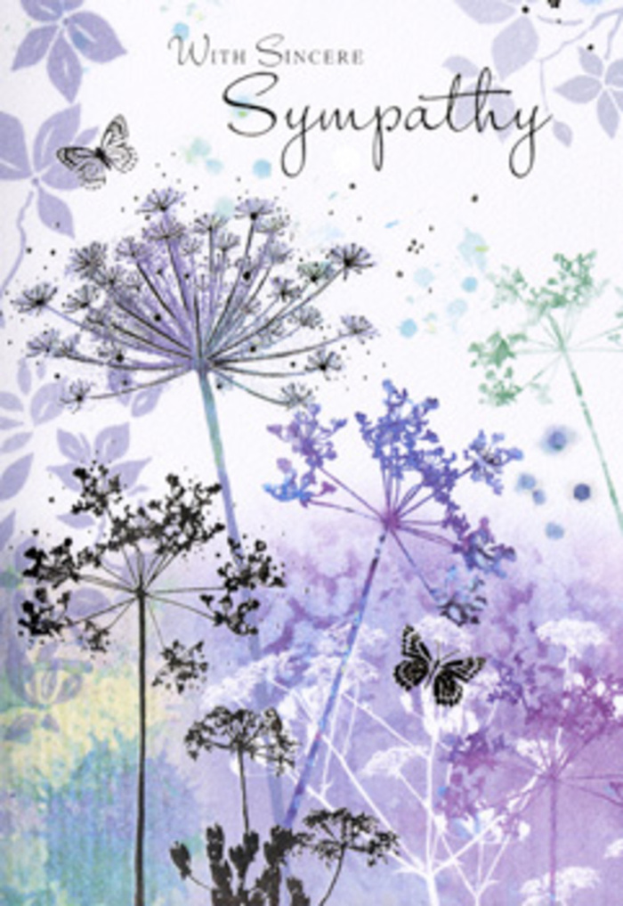 This sympathy card presents a scene that feels intimately connected to the soft, rolling landscapes around Guildford, as though the wildflowers on the page had been gathered in spirit from the meadows near Pewley Down. Tall, fine stems rise gracefully from the base of the design, sketched in subtle shades of cool grey and powdery green. At their tops, delicate umbelliferous flower heads bloom in a palette of violet, lilac, and dusty blue, each cluster a lacework of tiny florets that appear almost weightless. Some blooms are more defined, while others dissolve into faint silhouettes, giving the impression of depth and distance, like layers of wildflowers fading into morning fog. Hovering gently among them are two or three butterflies, rendered so lightly they seem no more than whispers of wings-soft outlines brushed with translucent lavender and silver, poised in quiet suspension. The background is a tender watercolour mist, a blend of muted purples and silvery greens that bleed into one another without edges, echoing a sky just after rain has passed over the Surrey Hills. Light in this composition is soft and forgiving, with a soothing glow rather than any stark brightness. As a florist familiar with creating condolence pieces for families in and around Guildford, I recognise the intention behind this artwork: it mirrors the way sympathy arrangements use texture, gentle colour and space to offer comfort without intrusion. The card invites the viewer to pause, breathe, and reflect, acting as a companion piece to a thoughtful floral tribute, expressing sympathy with dignity, tenderness, and the quiet reassurance of nature's enduring presence.