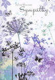 Opening this sympathy card feels like stepping into a gentle, twilight meadow on the edges of Guildford, perhaps along a quiet path leading away from the bustle of the town centre. Across the inner panel, airy silhouettes of wildflowers stretch upwards, their slender stems painted in soft greys and silvery greens. The flower heads are umbel-shaped and delicately detailed, with tiny blossoms fanning out like lace in shades of lavender, indigo, and muted blue. Some are sharply drawn, others fade into ghostlike outlines, creating a layered, dreamlike field that seems to sway in an invisible breeze. Soft washes of colour drift behind the stems-muted purples melting into smoky blue and pale, mossy green-suggesting distant hedgerows and gentle hills, the sort you might glimpse from a quiet spot near the River Wey. Scattered among the blooms, a few butterflies hover with near-translucent wings, their presence subtle yet meaningful, hinting at transformation, continuity, and the way love endures beyond loss. The overall palette is cool but comforting, like the calm that follows a Surrey rain shower, when everything is softened and still. As a local florist who often helps families choose flowers for funerals and memorials in Guildford, I see in this design the same careful balance we strive for in our arrangements: respectful, understated, and filled with quiet compassion. The card feels like a visual whisper of support, ready to accompany a sympathy bouquet delivered to a friend, neighbour, or loved one, offering not just words, but a moment of peace and reflection.